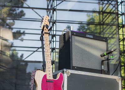 Whitney's guitar bathes in the summer sun. Photo: ColtonMarsalaPhotography.com