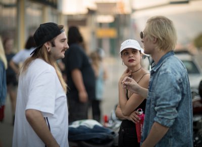 (L–R) Jordan Pack chats with Sara Collins and Yung Goya. Look for Yung Goya to perform at Gold Blood on Aug. 19. Photo: John Barkiple
