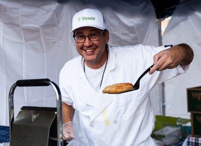 Johnny of V Panini holds up a one of his delectable panini creations. Photo: Chris Gariety