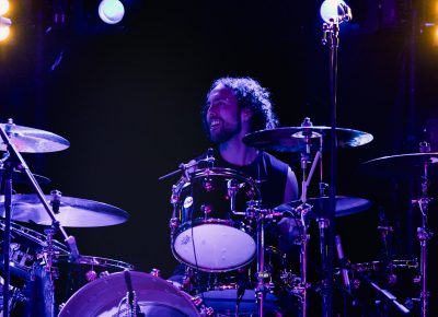 Joey Peebles playing drums with Trombone Shorty. Photo: Lmsorenson.net