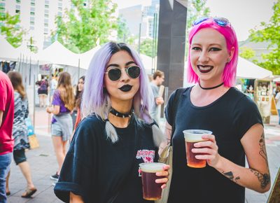 (L–R) Hannah Thomas and Elise Guzman were excited to see all the artists who came out to the Festival on Sunday afternoon. Photo: @taylnshererphoto