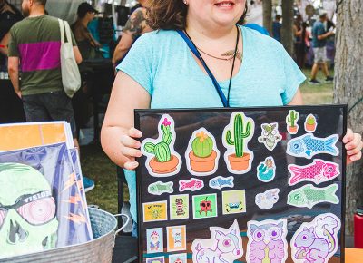 Jennifer Terry of Jennofire Designs props up her sticker collection that jumps right off the board. Photo: @taylnshererphoto