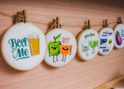 Sarah Beth Timmons' cross-stitched art is sure to put a smile on anyone’s face. Photo: @taylnshererphoto