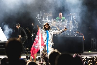 Fans wave flags and chant and sing along as Thirty Seconds to Mars play. Photo: Lmsorenson.net