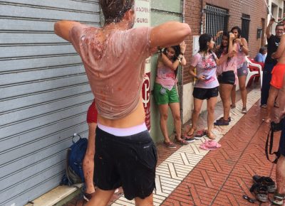 One participant shows a little skin and is rewarded with a mild soaking from the locals' water supply. Photo: Talyn Sherer