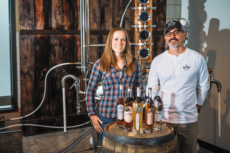 (L–R) Alpine Distilling’s Sara Sergent and Managing Director Rob Sergent make spirits that cater to Utah’s alpine lifestyle, starting with water in Silver Creek. Photo @clancycoop