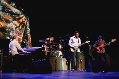 Robert Cray and his band playing onstage at the Eccles Performing Arts Center. Photo: @Lmsorenson.net
