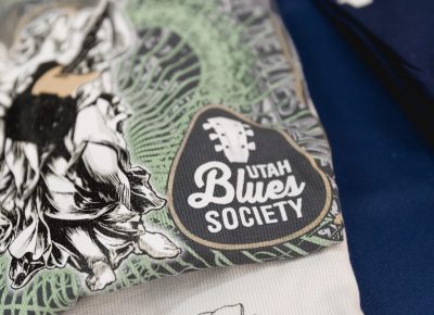 The Utah Blues Society has some snazzy thermal shirts for sale at a table inside the theater lobby. Photo: @Lmsorenson.net