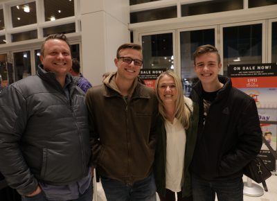 Mike, Brady, Christine and Brayden waiting in line for the merch table. Favorite CAKE songs include "Short Skirt," "Long Jacket" and "Mustache Man." Photo: Lmsorenson.net