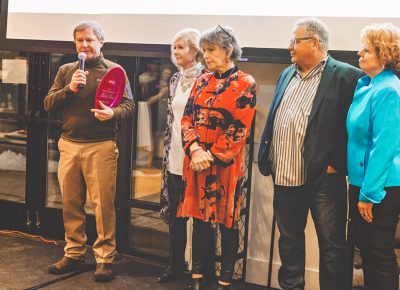 The staff at Log Haven accept their well-deserved Hall of Fame award while talking about the years of service they have provided at their home in Millcreek Canyon. Photo: Talyn Sherer
