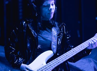 Twin Shadow's backup guitarist basking in the blue lights. Photo: Lmsorenson.net