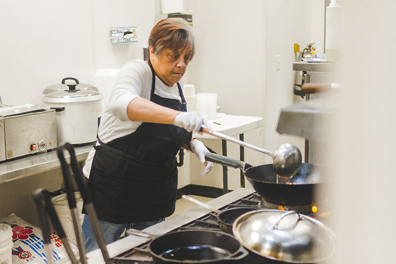 "Food has always been a family tradition." Hungry Hawaiian's Kathy Mahiai prepares some sumptuous, home-style fare.