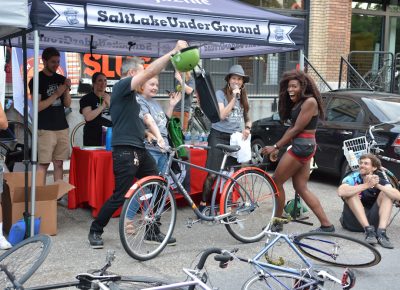 SLUG Cat women's category winner finding out her prizes included a brand new New Belgium Brewing city cruiser.