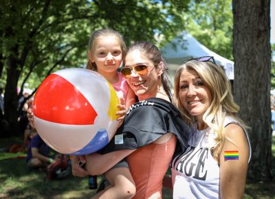 ((L-R) Love brought Payton, Tarah and Tina to the Pride Festival. “These are my people. I was gay before I met her dad 13 years ago, and we have three kids. When we’re separated, I sleep with women. Tina’s my best friend,” Tarah said. Photo: John Barkiple