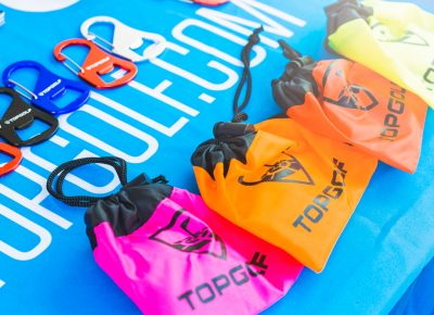 TopGolf draws a crowd with their brightly colored swag. Photo: Talyn Sherer