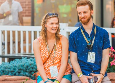 Two Tastemakers patrons relax their feet and stomachs after making their way through several vendors. Photo: Talyn Sherer