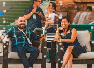 (L–R) SLUG Editor Alex Ortega enjoys a drink with his fiancée, artist Nancy Rivera. Photo: Talyn Sherer