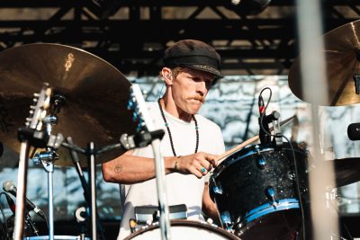 Drummer for Foster the People, Mark Pontius, braving the sun on this crazy summer day. Photo: Lmsorenson.net