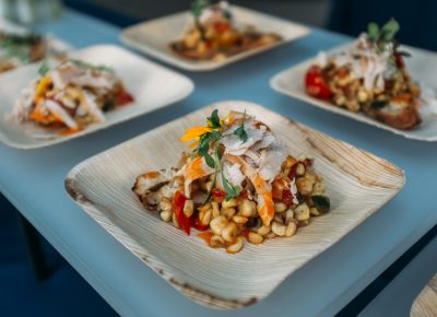 The Blended Table served a Utah corn and heirloom tomato salad with Smokey Mary's chicken served on bruschetta. Photo: @clancycoop