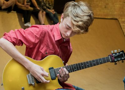 School of Rock’s Colton Bailey “can play anything, especially classic rock,” his dad, School of Rock owner Lamont Bailey, said.