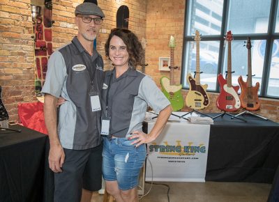 (L–R) Justin and Daphne Pearce from String Kings and Joe’s Guitars filled their corner of SLAMM with beautiful guitars. Justin’s String Kings is a production line with a two-to-three-week lead time for manufacture, and his Joe’s Guitars line is fully customizable with a three-to-six-month lead time.