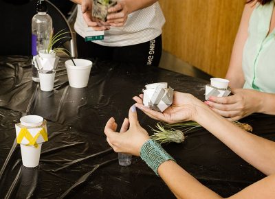 Crafters coming together at the concrete air planters workshop.
