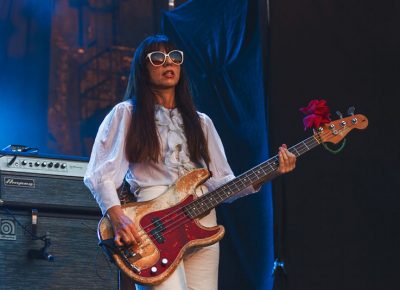 Paz Lenchantin keeps rockin the shades as the sunset blinds the stage.