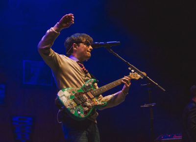 Ending "Beverly Hills" on a high note, Rivers Cuomo raises his pic in the air.