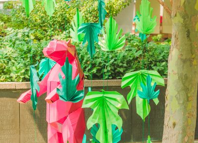 A Craft Lake City bear tries to assimilate with the paper leaves.