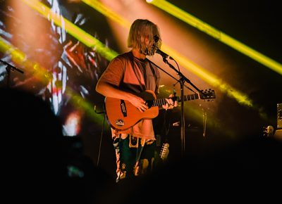 Cole performing to a lively crowd.