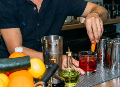 Jacob Hall puts the finishing touches on a Sazerac cocktail. Photo: @clancycoop