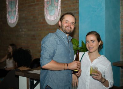 Cameron Hauck and Amy Garcia posted up at the bar, adjacent the large open area for standing. (L-R) Photo: @clancycoop