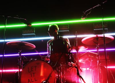 Ryan Winnen on drums and some sick lighting behind him. Photo: @Lmsorenson Photography