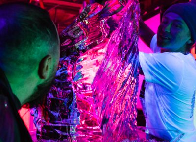 An unspecified senior editor takes his ice luge shot the more traditional way.