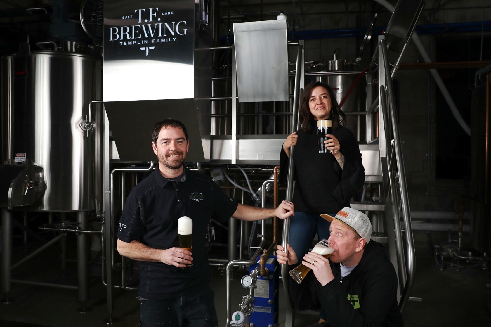 (L–R) Co-owner/brewer Kevin Templin, Brittany Watts and Jaron Anderson band together for the family feel of T.F. Brewing and its German-style lagers. Photo: LmSorenson.net