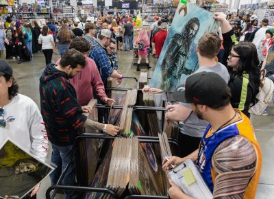 Everything nerdy for sale at FanX19 inclluding massive posters. Pro Tip: Have a plan for storing such large purchases during the con, or you will be stuck holding it all day... Photo: @Lmsorenson
