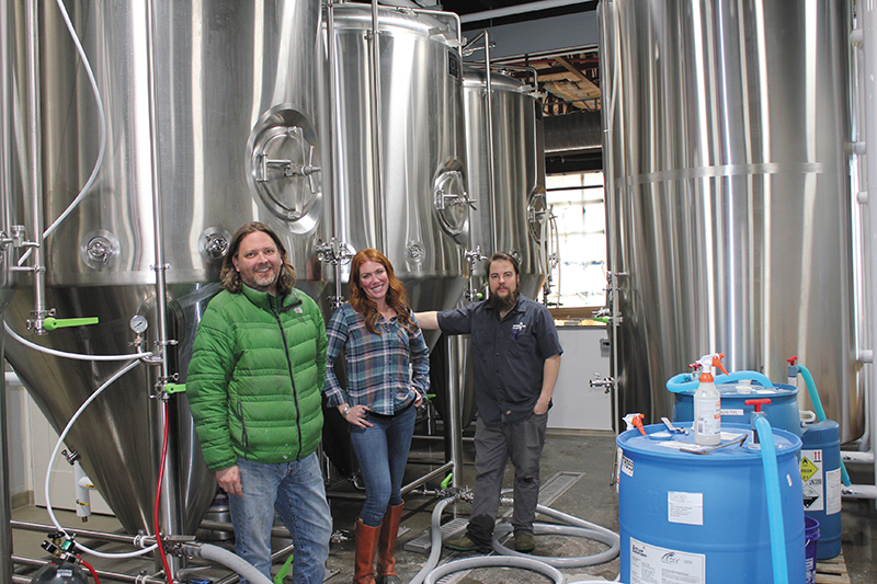 (L–R) Owner Mark Medura, Sales & Marketing Manager Katie Flanagan and Head Brewer Chris Detrick are kicking of Level Crossing Brewing Company in South Salt Lake with mostly classic ales.