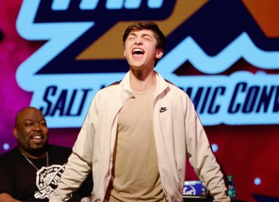 Showing fans the classic line "SHAZAM!" Asher Angel on stage at Salt Lake Comic Convention FanX19. Photo: @Lmsorenson