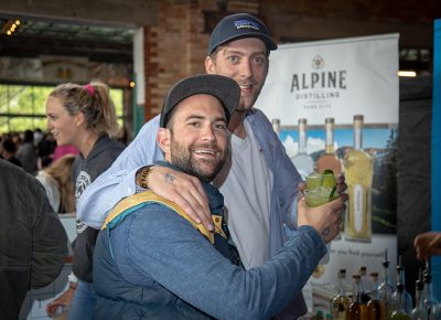 (L-R) Earle Lindel IV and Dave Pavone couldn’t get enough of the cocktails shaken up by Alpine Distilling (with cucumber juice, lemon juice, zaatar spices and Alpine’s Summit Gin). It’s a drink worthy of every one of Lindel’s drink tokens. Photo: John Barkiple