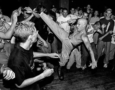 Hardcore punks and straightedge kids thrash in the pit to the band Ookla the Mok, performing at the Tower Theater in Salt Lake City on August 16, 1998.