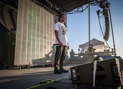 Primed to perform, opener Denzel Curry broods as he prepares to launch into his setlist. Photo: Colton Marsala