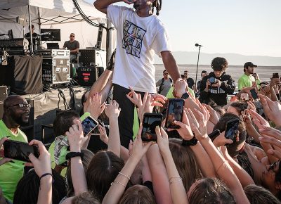 With the crowds's hands reaching upwards, rapper Denzel Curry rattles off his verse. Photo: Colton Marsala