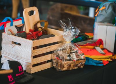 The prizes for the raffle drawing are lined across the table, getting patrons eager to buy more entries. Photo: Talyn Sherer