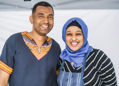 (L-R) Chef Abudu and Fouzia Abdirahaman had a serious line forming for Discover Food Festival attendees to get their hands on the delicious Caribbean and African fusion known as Kafe Mamai. Photo: Talyn Sherer