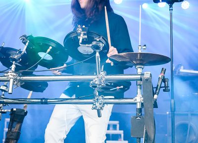 Big Wild bathed in the blues and greens of the Gallivan Center.