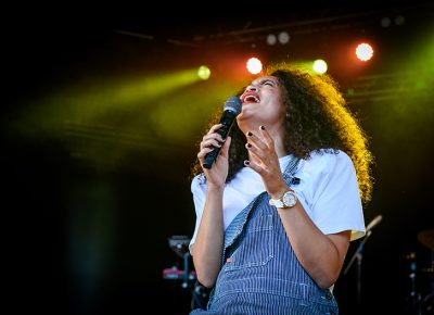 ROC NATION artist Nicole Bus throws her head back and overpowers the audience with her strong voice.