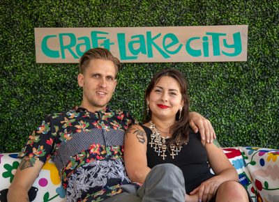 (L-R) Kyle and Bianca relax on the sustainers’ sofa. Craft Lake City is building a base of monthly donors to help fund year-long education and programming.
