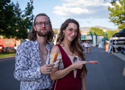 (L-R) Jake Chamberlain and Kine Kino grab some di Fruitta pops—strawberry mango for him and watermelon mint for her. He also performed at Craft Lake City’s SLUG Stage in Jake and the Heist.