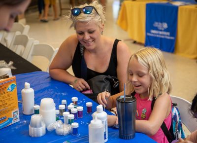 The glitter slime activity in the STEM crafting area pleased dozens of pint-sized scientists. “Slime again?” Kids squealed in joy as parents rolled their eyes.