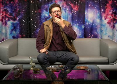 Man smoking weed out of an apple